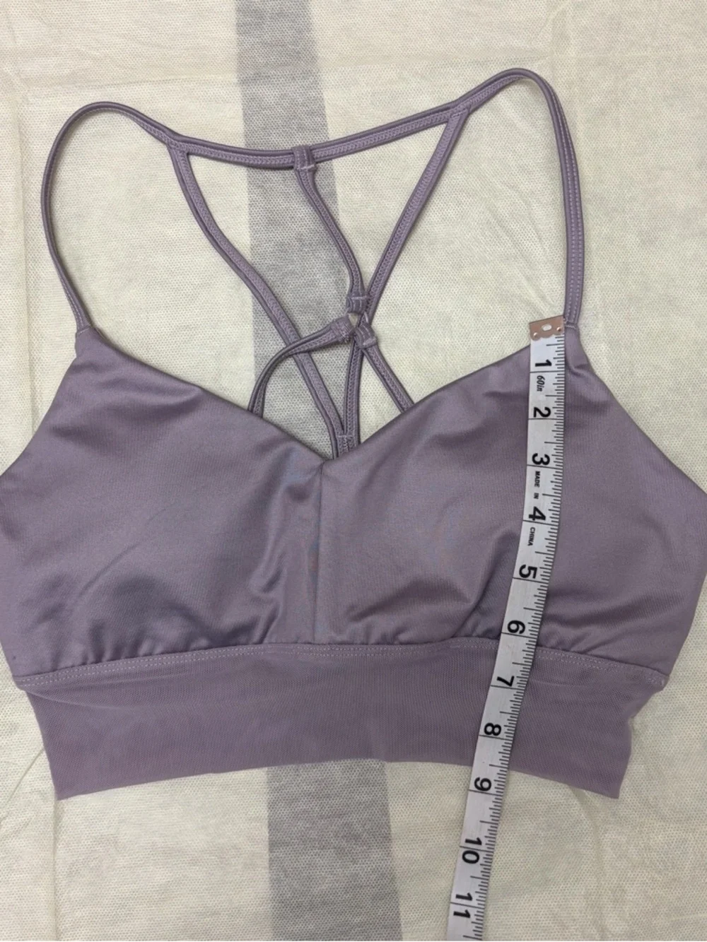 ALO Yoga Lavish Sports Bra in light purple. With removable pads. Size SMALL.